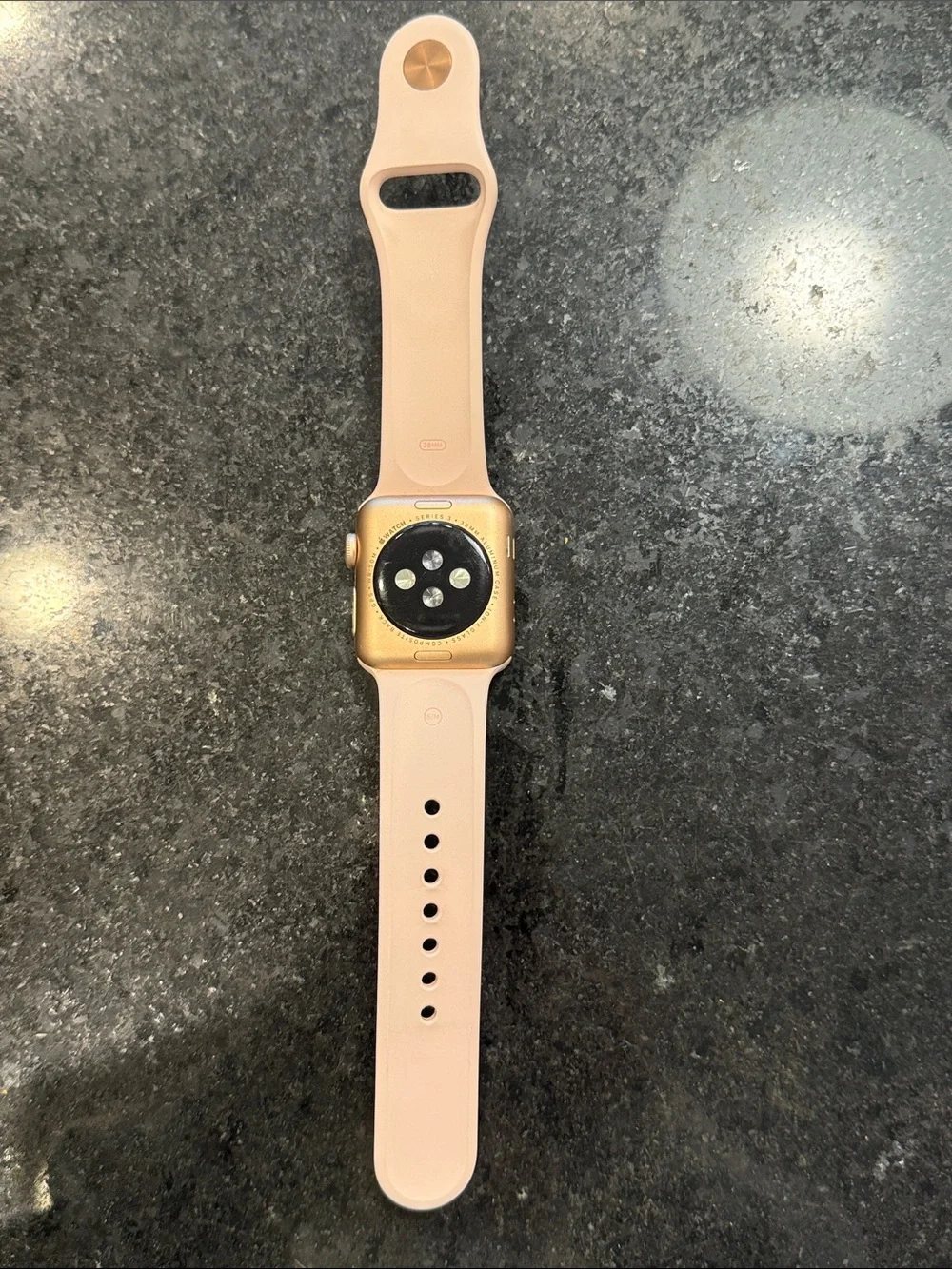 Apple Watch Rose Gold 38mm. Scratches visible on screen, but still works great!
